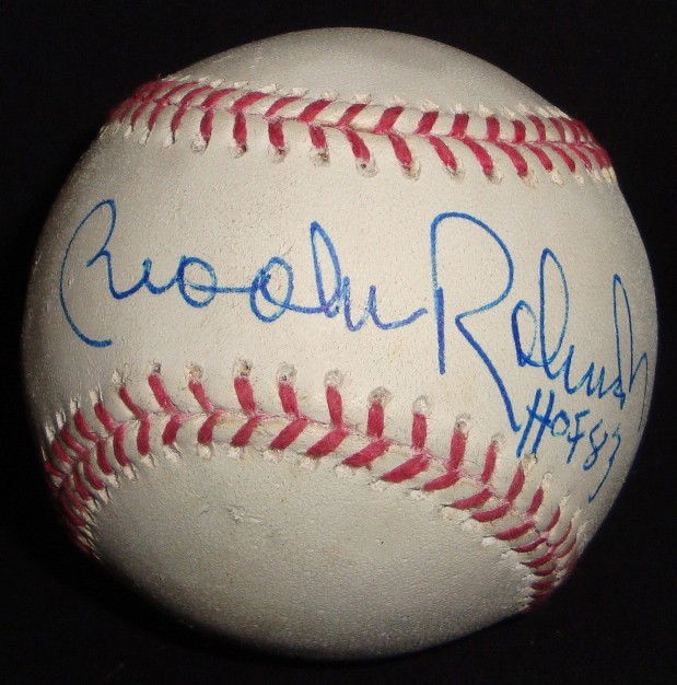 Brooks Robinson Autographed Baseball: Official MLB Bud Selig Baseball signed by Brooks Robinson on the sweet spot in blue ballpoint pen with 'HOF 83' inscription; nice, clean signature from the former Orioles third baseman.