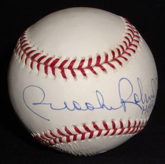 Brooks Robinson Autographed Baseball: Official MLB Bud Selig Baseball signed by Brooks Robinson on the sweet spot in blue ballpoint pen with 'HOF 83' inscription; nice, clean signature from the former Orioles third baseman.