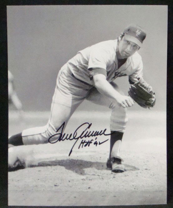 Tom Seaver Autographed 8x10 Photo: Tom Seaver Autographed 8x10 Black and White Photo; signed in black sharpie marker with 'HOF 92' inscription; nice signature by the Hall of Famer; comes with a COA from MAB Celebrity Services.