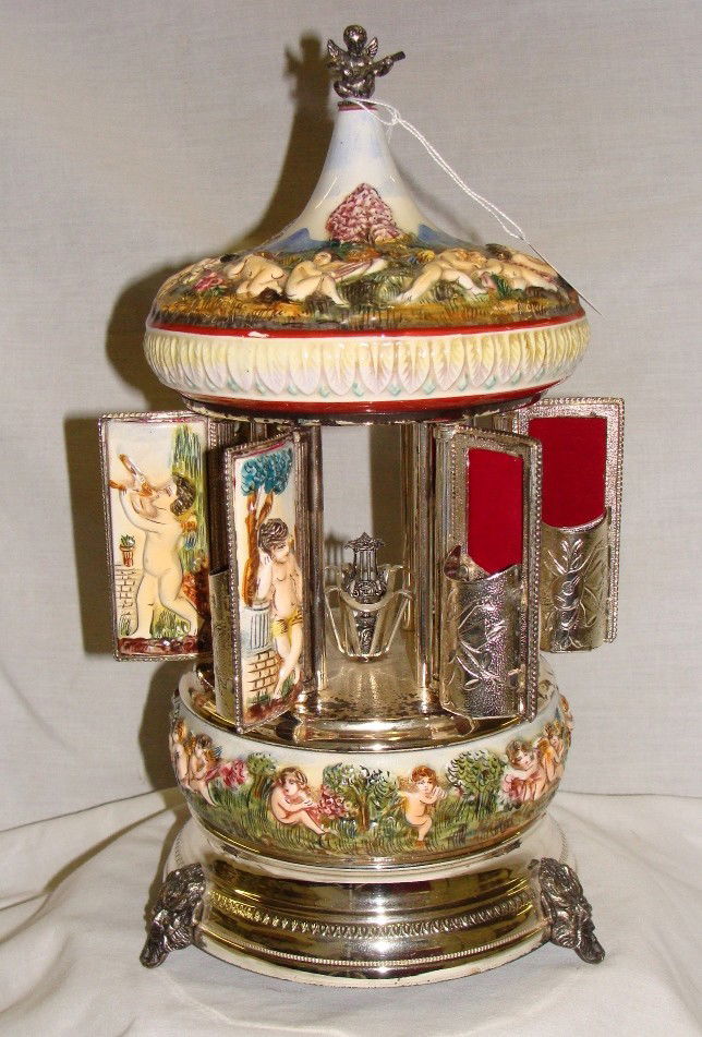 Reuge Capodimonte Musical Carousel Cigarette Lipst: approx 15" tall works fine with some silver loss