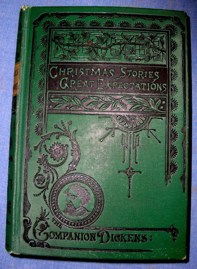 1884 Christmas Stories Great Expectations, Dickens: "Christmas Stories From Household Words And All The Year Round” by Charles Dickens, Perry Mason & Co., 1884. hard cover; Light wear to edges and small tear to bottom of title page else very good con