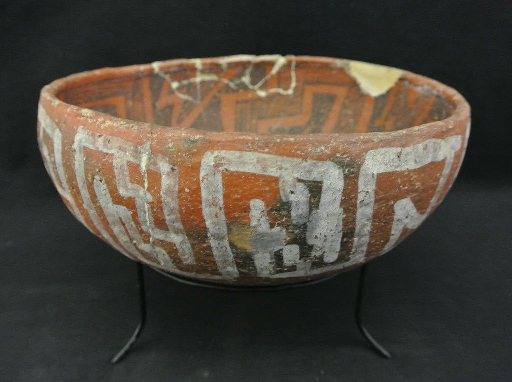 Prehistoric St. John’s Polychrome Pottery Bow: Prehistoric St. John’s Polychrome Pottery Bowl. This unusual bowl features black and red designs on the inside and white designs on the outside, all on a red slip. It measures 7 ¾” in diameter x