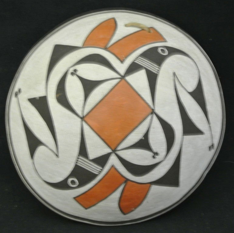 Acoma Pueblo Pottery Bowl by Famed Potter Lucy M.: Acoma Pueblo Pottery Bowl by Famed Potter Lucy M. Lewis. This beautiful shallow bowl has a red and black design on a white slip. There are 2 hanging holes and it is signed and dated 1969 0n the inside