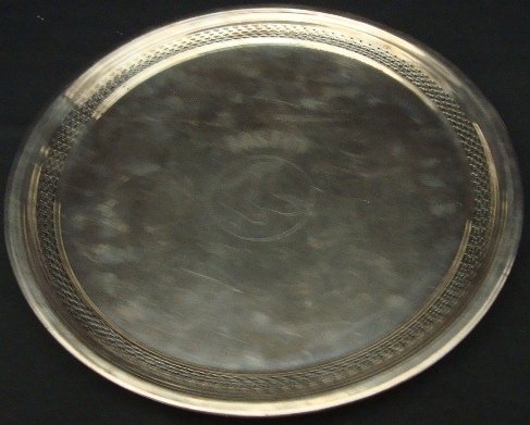 Boston Red Sox Round Silver Plate Platter: Boston Red Sox Round Silver Plate Platter; measures approx 12-1/8" in diameter; very nice platter with Boston Red Sox Logo etched in the center of the platter; three-footed on the bottom with one of f
