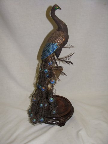 Peacock on Horn w Enemal Feathers and Filligree: overall height is 18" which includes the 2" base, there Are some center stones missing from the back feathers