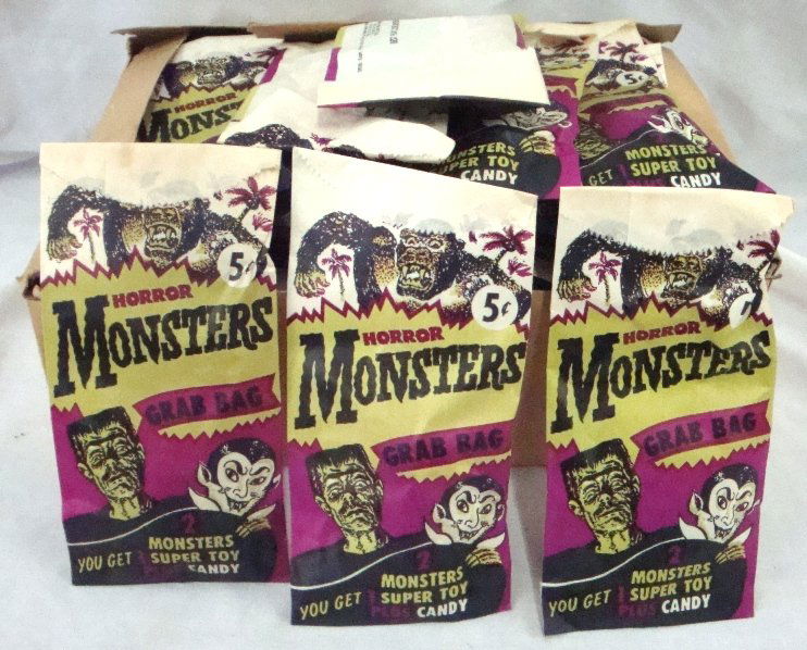 Lot of (50) 1960's Horror Monsters Grab Bag Packs: Lot of (50) 1960's Horror Monsters Grab Bag Packs; all packs are unopened and in very good condition; each pack includes (2) monster super toys and candy; great collectors pieces.