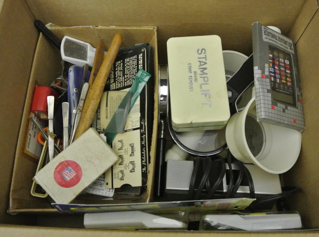 Balance of One Man's Stamp Supplies Lot: Large carton full of used but useful philatelic supplies incl. magnifying glasses, tongs, stamp drying books, stamplift, UV light, etc. Much of use here so take a look. Est.$50-100