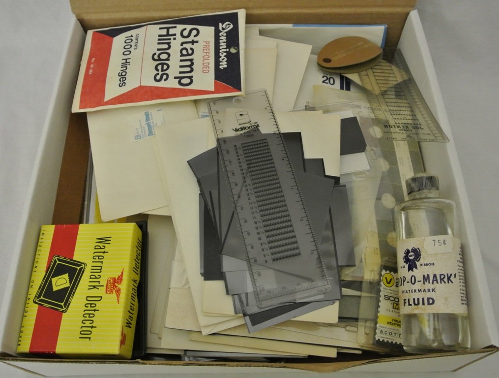 Useful Supply Lot: Useful lot of black background mounting strips in packages, several magnifying glasses, watermark tray & fluid, etc. Est.$30-50
