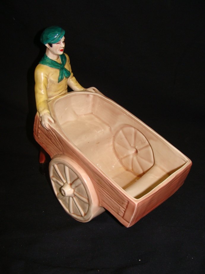 FLORENCE CERAMICS WHEELBARROW VASE PLANTER: 9 1/2' X 9 1/2" NO APPARENT ISSUES