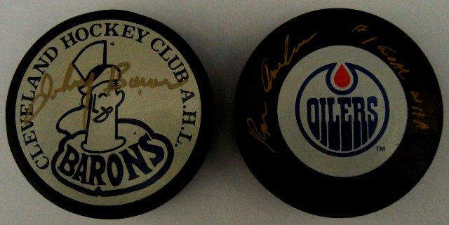 Lot of (2) Autographed Hockey Pucks, Bower, Anders: Lot of (2) Autographed Hockey Pucks; includes Johnny Bower Autographed Cleveland Barons Club A.H.L. Hockey Puck; nice signature in gold sharpie marker by the hockey great; Ron Anderson Autographed Hou