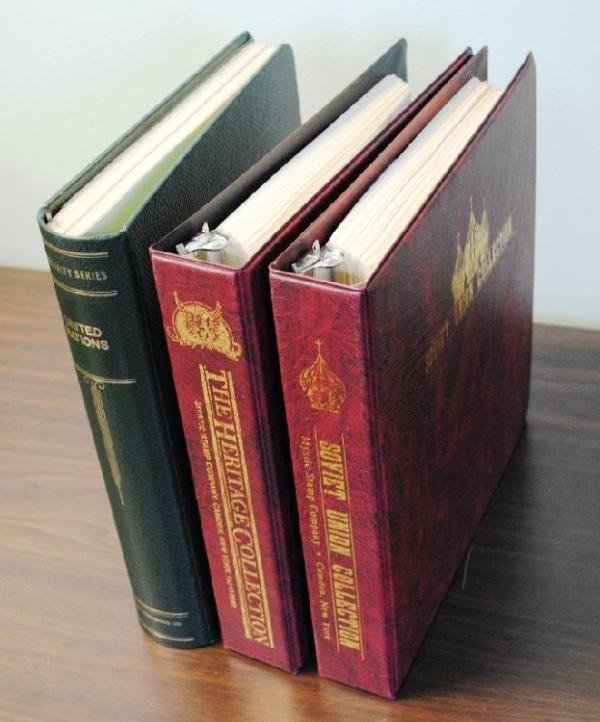 Useful Supply Lot: Useful lot of three unused albums incl. (2)Mystic albums for Soviet Union and U.S. issues, a Scott UN album and then some supplements. All are fresh and useful. Est.$50-100