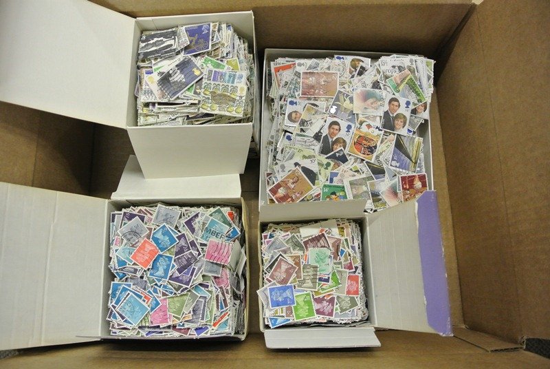 Great Britain Off Paper Stamp Mixture: Several thousand stamp, all used in small boxes. Two of which are small boxes of used Machins, the other two are small boxes of commemoratives. About two pounds of off paper mix. Much to pick through.