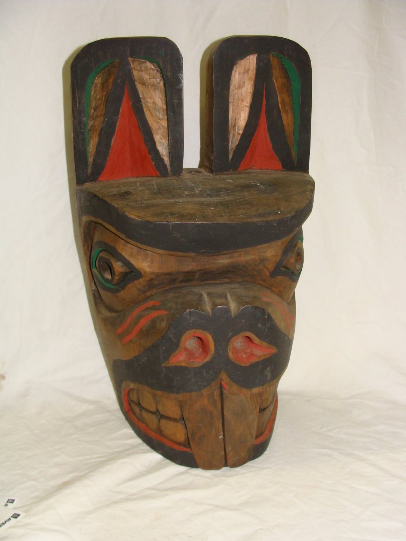 North West Coast Carved Beaver Mask Cicero August: North West Coast Carved Beaver Mask by Cicero August. Very well done carved and painted mask measuring 15” tall x 9” wide x 6” deep. Carved on Back is “ Beaver Mask, Cicero August, Cowichan Ba
