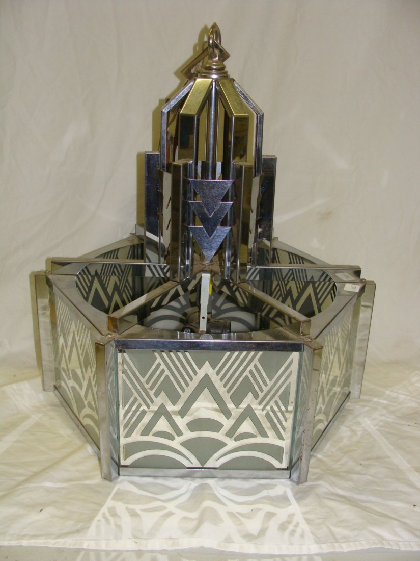 Art Deco Hanging Light Fixture: 6 Paneled Hanging Fixture, each panel is 9" wide x 7", the width across is 18" and it is 18" tall to the base of the hook.
