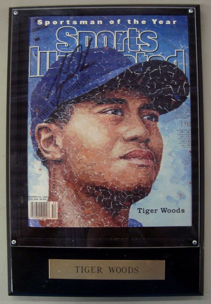 Tiger Woods Signed 1996 Sports Illustrated Magazine: Tiger Woods Signed 1996 Sports Illustrated Magazine; magazine dated December 23, 1996 "Sportsman of the Year" issue featuring Woods on the cover; signed by Woods on the cover in black sharpie marker;