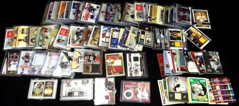Lot of (100+) Game Used Jersey & Bat & Ball Cards, w: Lot of (100+) Game Used Jersey & Bat Cards; includes Jim Brown, LeBron James, Alomar, Lee, Martinez, Sizemore, Newsome, Vizquel, Thome and others.