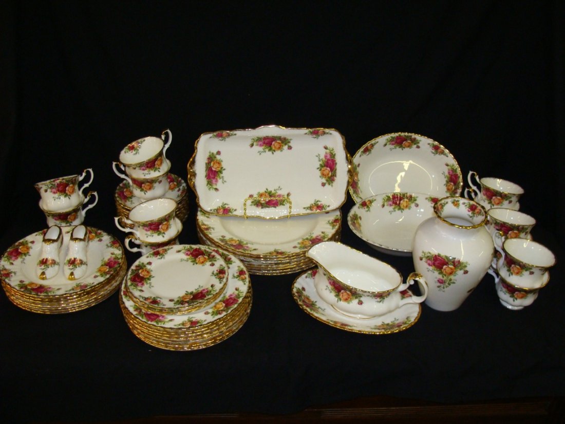 Royal Albert Old Country Rose Dinner Pattern 53 pc Set: Set includes 7 - 10 1/2" plates, 15 - 8 1/8" plates, 8 saucer, 12 cups, 2 Bread & butter plates, 2 Shoes, 2 - 9" x 7" oval veggie bowls, an 11 1/2" x 6 3/4" celery dish, Gravy & underplate, and a vase