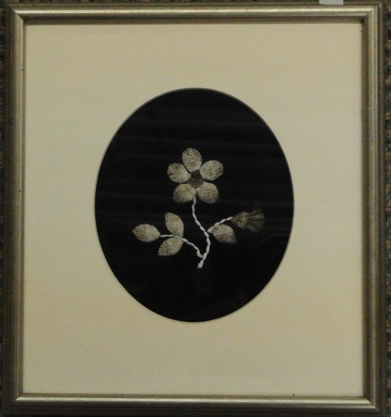 Framed Moose Hair Tufted Flower Design on Velvet: Framed Moose Hair Tufted Flower Design on Velvet by First Nations Artist Julia Trennert. The velvet oval measures 6.75” high x 5.75” wide and the frame measures 11.25” x 12”. Julia is from Akl