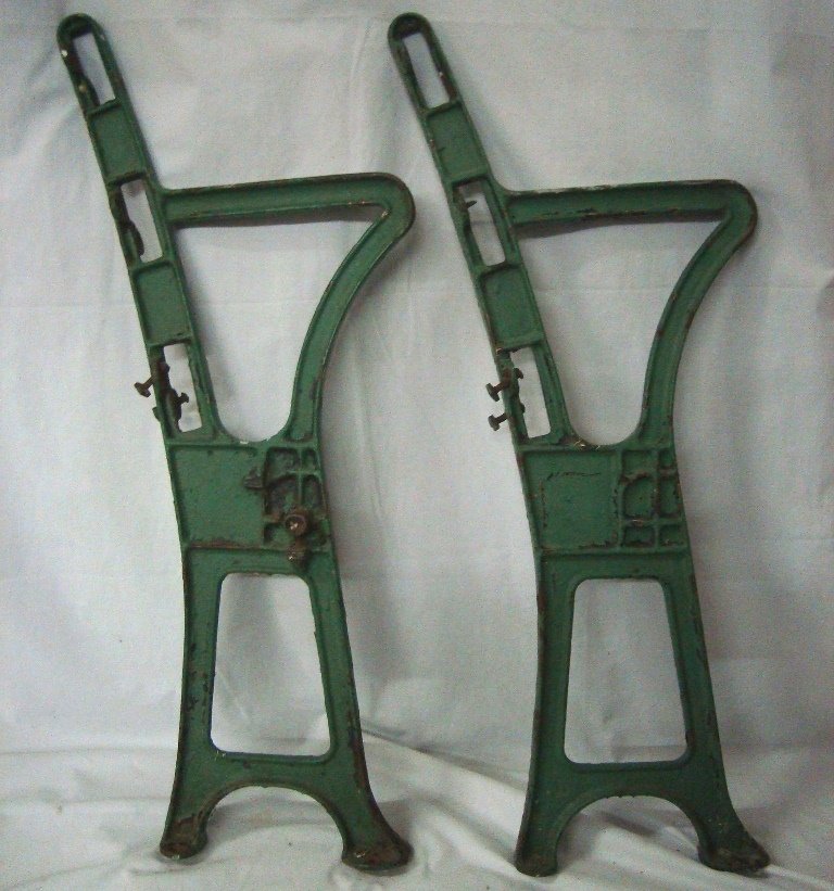Pair of Original Cleveland Municipal Stadium Seat Irons: Pair of Original Cleveland Municipal Stadium Seat Irons ; original green painted seat irons measuring approx 32" tall and 14" deep; paint is chipped in areas, but all original and does not take away f