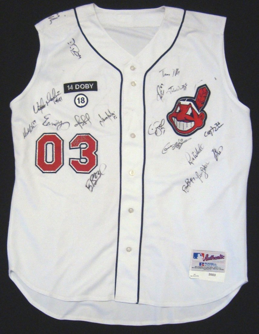 2003 Cleveland Indians Team Signed Jersey, (17): 2003 Cleveland Indians Team Signed Jersey; nice 2003 Russell Athletic Sleeveless Cleveland Indians jersey signed by (17) of the 2003 team members; signatures include Victor Martinez, Ernie Young (2004