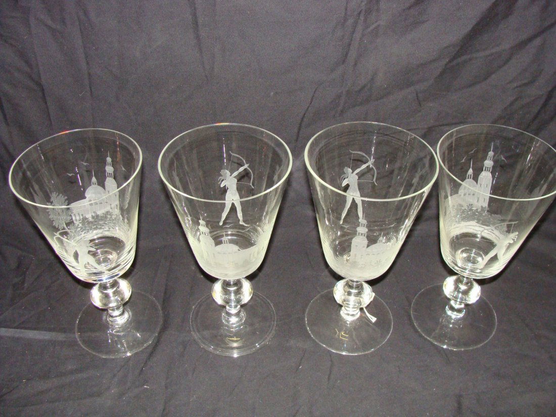 4 Large 8 1/2" Moser Intaglio Nude Archer Glasses: Marked Moser on the bottom, 8 1/2" tall, with a 4 5/8" top diameter.