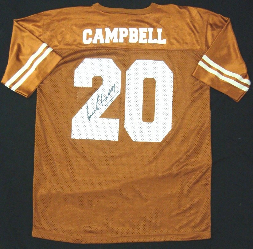 Earl Campbell Autographed Texas Longhorns Jersey, SGC: Earl Campbell Autographed Texas Longhorns Jersey; part of the Earl Campbell Signature Collection, this burnt orange mesh Longhorns jersey sports a retired #20 on front and back, along with Campbell's 