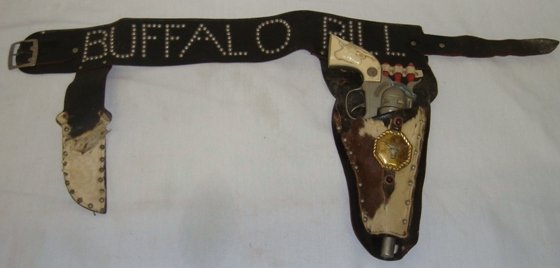 Children's Buffalo Bill cap gun Cowboy Belt w/cap gun: Children's Buffalo Bill cap gun Cowboy Belt w/cap gun. Cap gun and knife holder, not sure if cap gun goes with belt originally