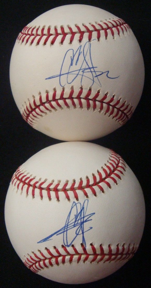 Pair of CC Sabathia Single Signed Baseballs: Pair of CC Sabathia Single Signed Baseballs; nice duo of single signed balls signed by the former Cleveland Indians pitcher; includes Official Major League Bud Selig ball signed on the sweet spot in b