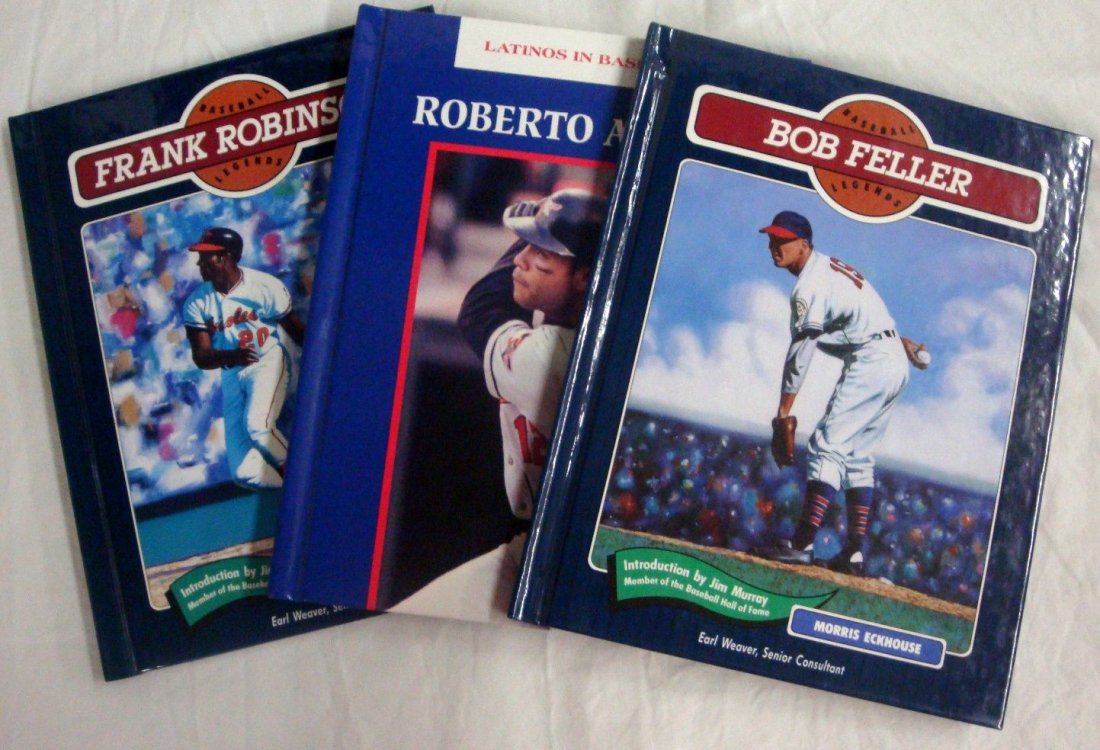Roberto Alomar, Bob Feller, Frank Robinson Signed Books: Lot of (3) Books Signed by Baseball Superstars; includes 'Roberto Alomar: Latinos in Baseball' by Norman L. Macht, Mitchell Lane Publishers, Childs, MD, hardcover, 64 pages, signed by Alomar on the in