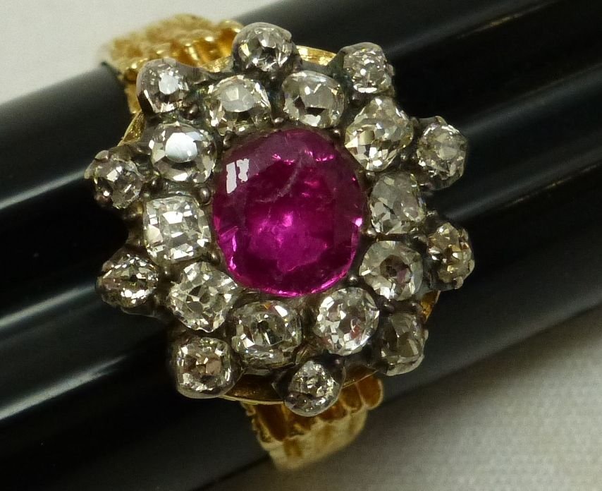 large Solitaire and Diamond chip ladies cocktail ring: size 7 3/4, marked G14k, tw 6.2 grams