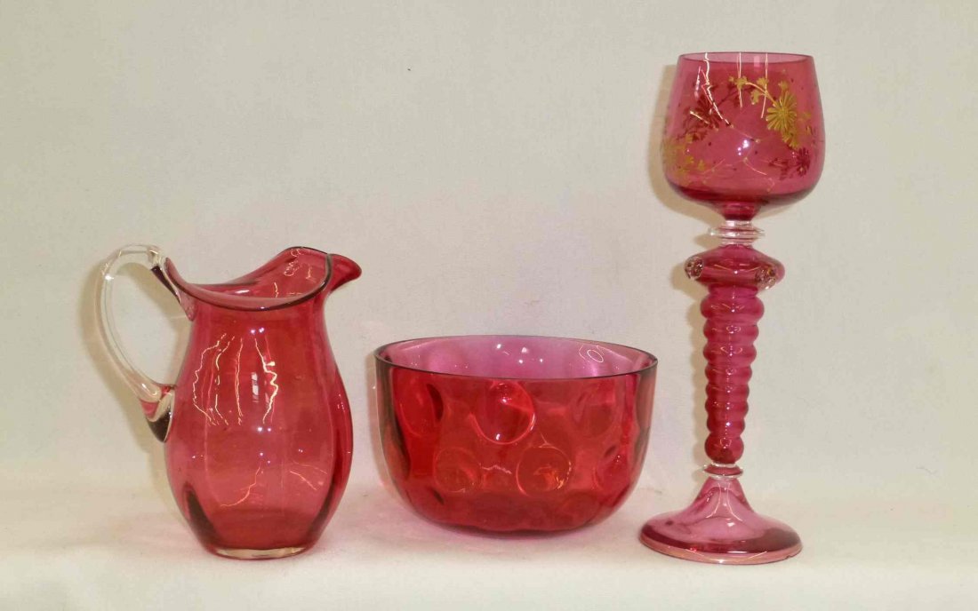 3 Piece Collection Ruby Red Cranberry Glass: Includes Cream Pitcher 4 1/4", Wine Goblet 7 3/4", and a finger bowl2 7/8" tall x 4 3/4" d with edge chipping.