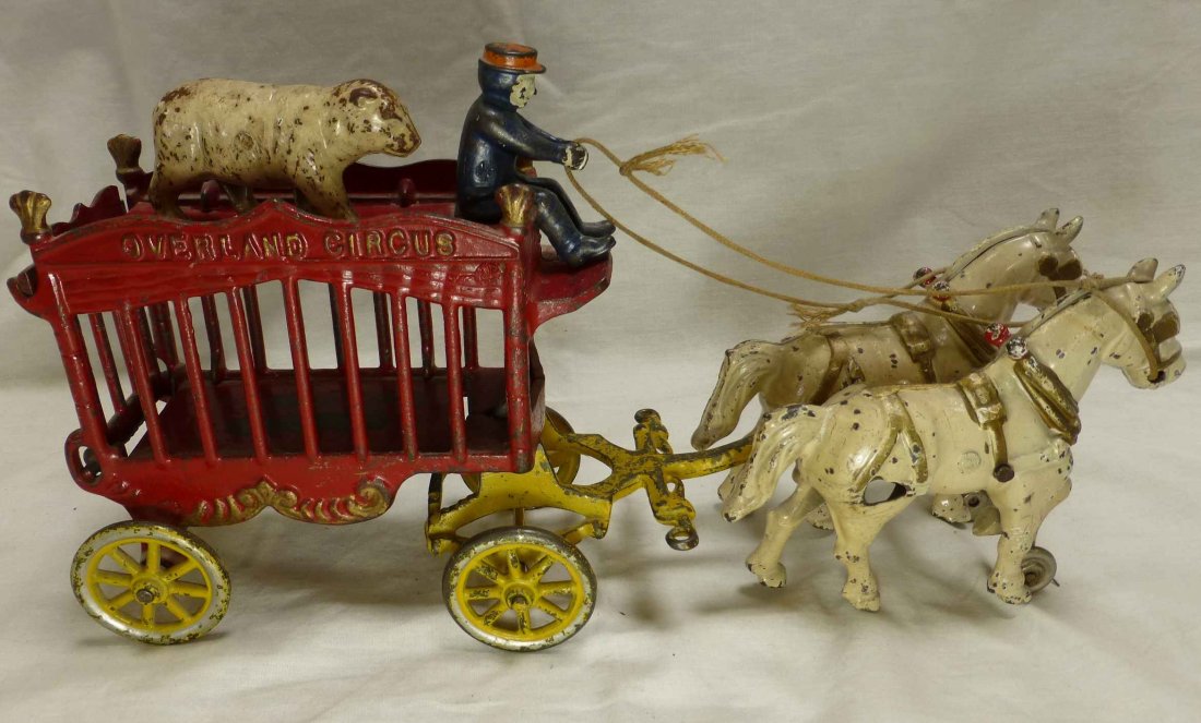 Cast Iron Overland Circus Carriage with Animal: As pictured with accessories and original paint, with caged animal and coachman.