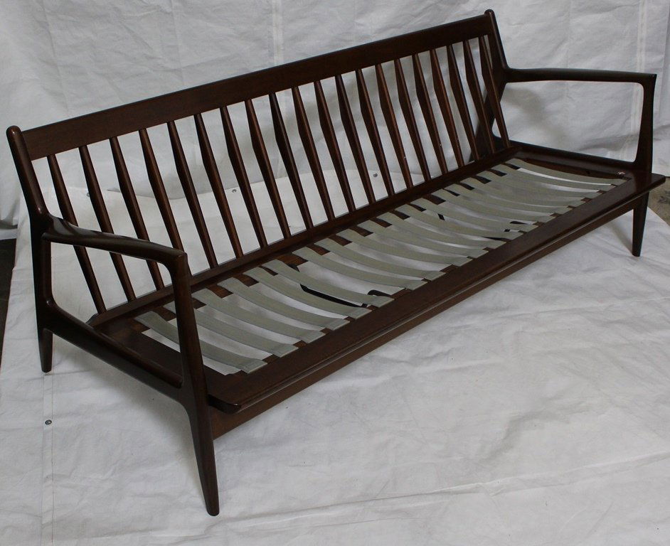 Mid-Century Modern Kofod Larsen Selig Sofa: Three cushion wide sofa in stained beech as designed for Selig furniture company. Excellent overall condition. Original Selig button tag. No condition problems to report. Sofa is 74" long and 28" tall