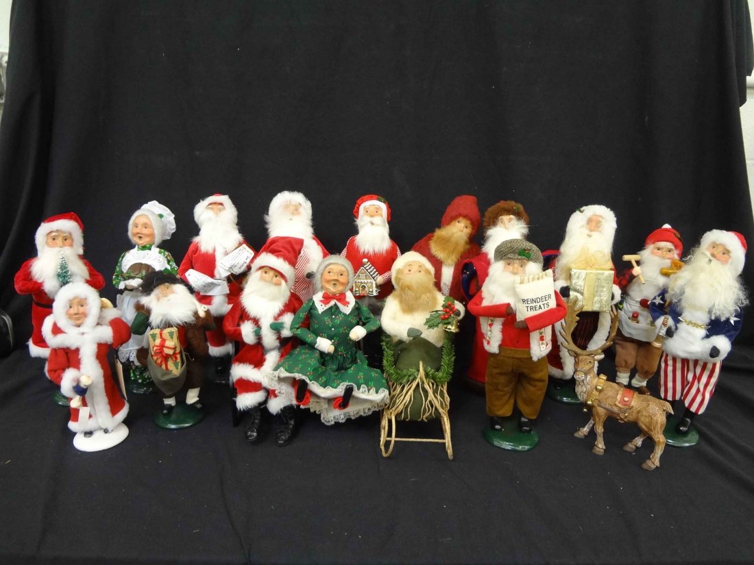 (17) Buyer's Choice The Caroler's Santa's Figurines: (17) Buyer's Choice The Caroler's Santa's Figurines: A wonderful group of 17 figures. All of these are Santas or mrs. Claus. All vary in size from 9" to 13" high. All have tags, seals, and marks on th