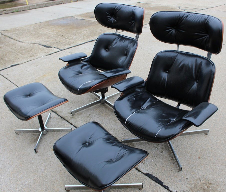 Pair of Selig Chairs & Ottomans Eames Style: Pair of Charles & Ray Eames inspired Selig chairs with ottomons. Lounge chair and ottoman, USA, 1970s; Vinyl, chromed and enameled steel, walnut; 39" x 33" x 34", ottoman: 16 1/2" x 31" x 17 1/2". Chi