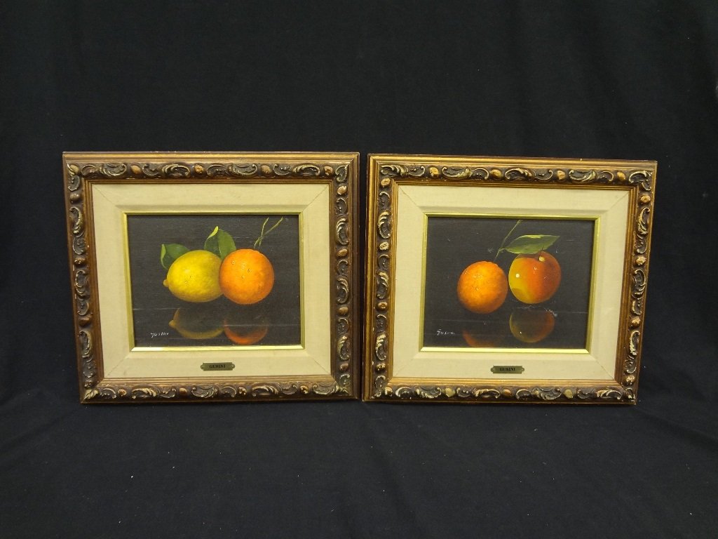 (2) Antonio Gusini Oil on Canvas: Still Life "Orange: (2) Gusini Oil on Canvas: Still Life "Orange and Lemon", and "Orange and Apple": Both dropped mounted in a gold edge polished wood frame. Both measuring 16 1/2 by 14 1/2. Some light crackling througho