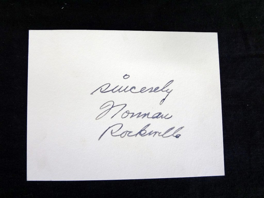 ?Norman Rockwell÷ Cut Signature 3 x 3 card. Comes with: ?Norman Rockwell÷ Cut Signature 3 x 3 card. Comes with LOA from JSA: A nice cut signature from the famed Americana artist Norman Rockwell. On a small card and comes with a LOA from JSA.
