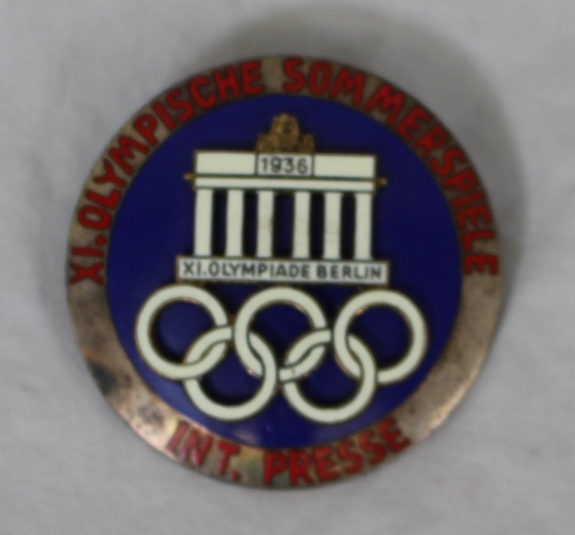 1936 Berlin Olympics International Press Badge: International Press Badge made by Rob. Neff. M/c enamel, size 4.6cm, not an official badge! Age appropriate wear. Tough to find.