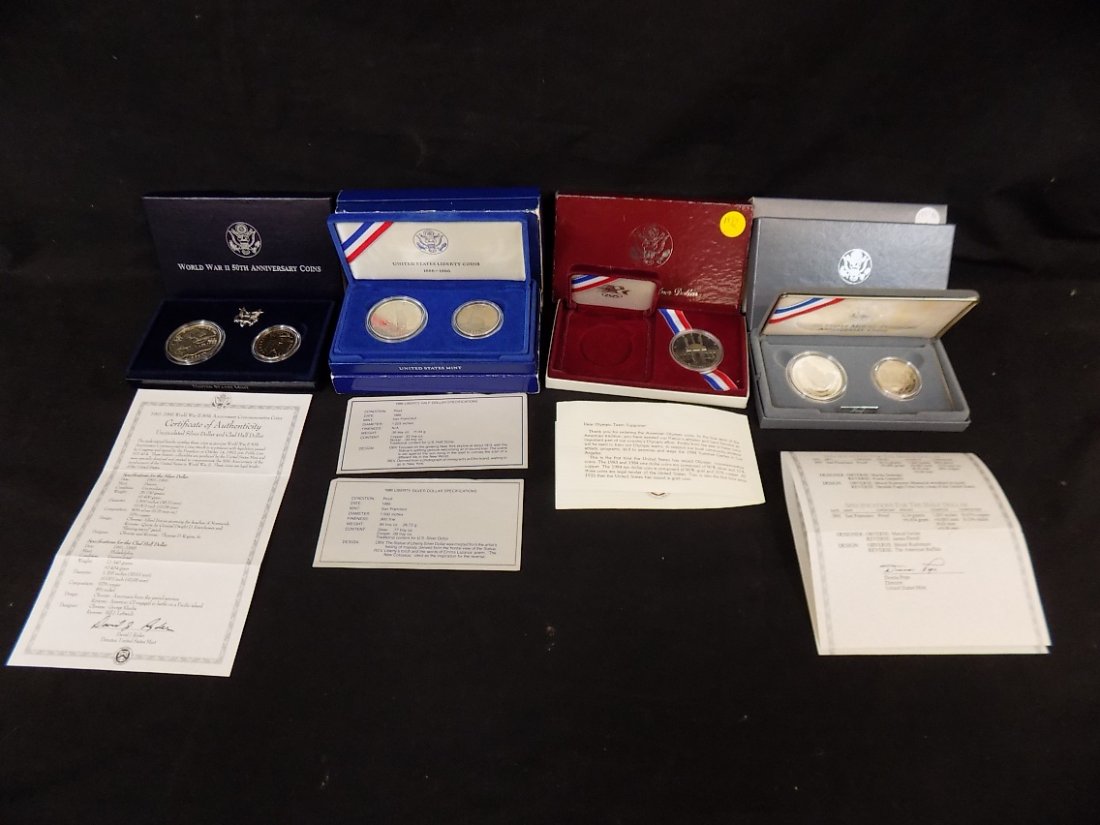 5 US Mint Silver/Clad Sets World War 2, 1986 Liberty,: 5 US Mint Silver/Clad Sets World War 2 90% silver Dollar/Clad Half, 2 Sets 1986 Liberty .77 Troy oz Silver Dollar/clad half , 1984 Olympic 90% silver dollar, 1991 Mount Rushmore 90% Silver dollar/clad