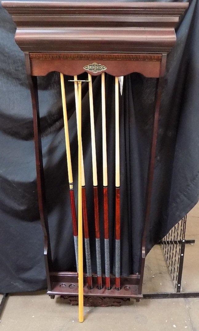 Brunswick Billiards Wall Rack Pool Cue Stick Holder,: Brunswick Billiards Wall Rack Pool Cue Stick Holder, holds 8.. Nice wood rack with 5 matching sticks included. Also present are a 15 ball rack and a 9 ball rack