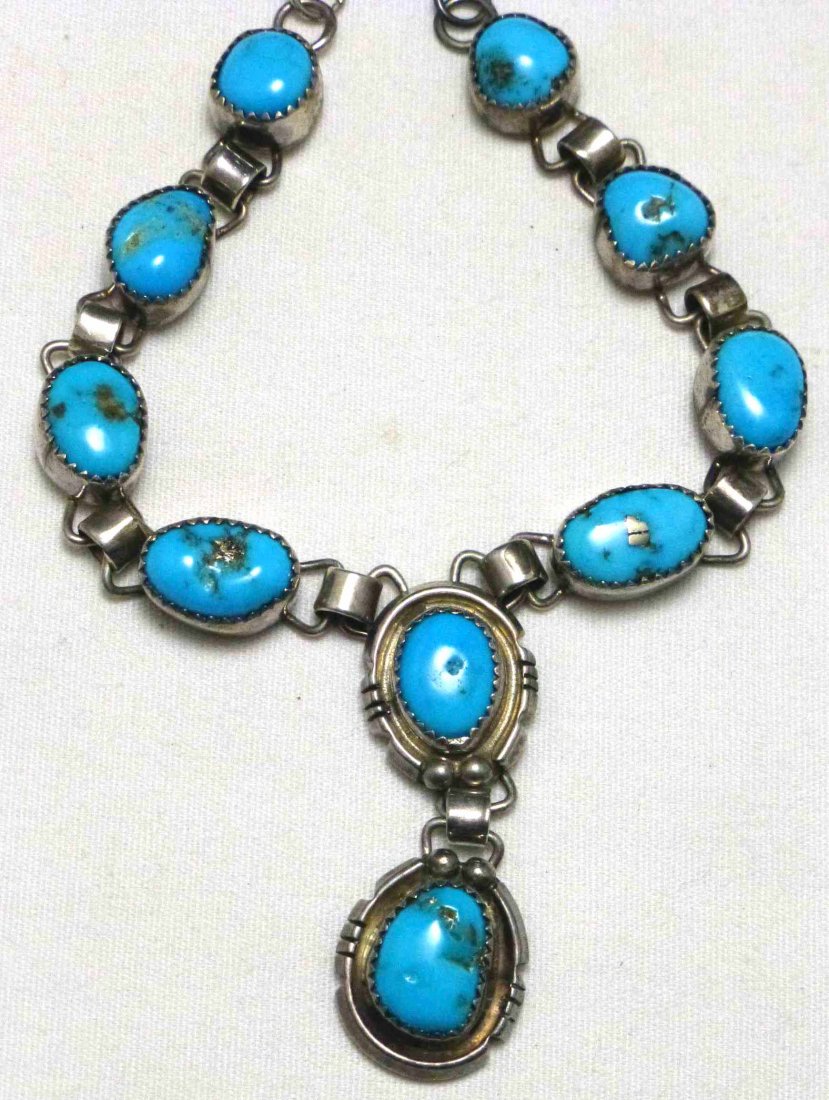 Baer Signed native American 10 Stone Turquoise Necklace: Signed Ted(Jed) Baer Sterling along with a makers marks on the back. Stones are approx 1/2" long