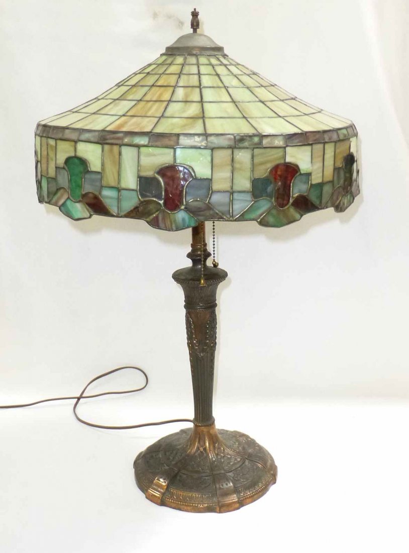 Chicago Mosaic style leaded & stained glass table lamp: Chicago Mosaic Style leaded & stained glass table lamp, 24" tall, 8 3/4" base, shade is 16 1/4" diameter x 8 1/4" deep.. some cracked panels and pieces, please review pictures of the cap. Base is sign
