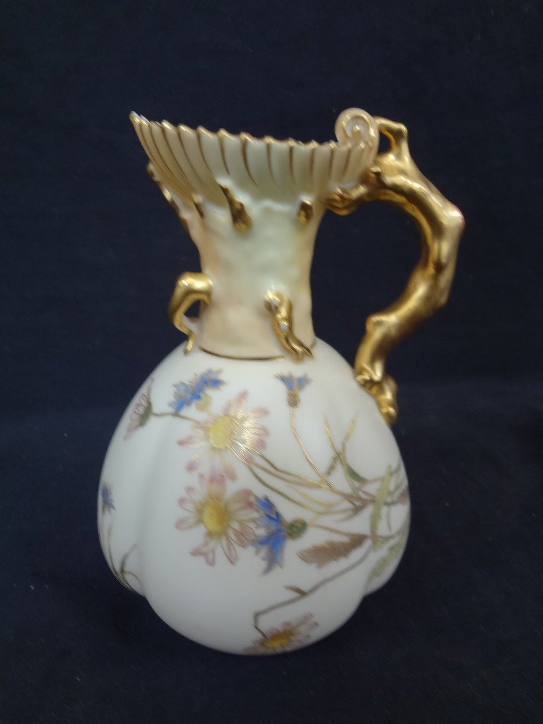Royal Worcester Branch Handled Pitcher 6" tall Hand: Royal Worcester Branch Handled Pitcher 6" tall Hand Painted: Royal Worcester 6 inch tall pitcher. Gilded branch handle. Nice bold mark on bottom. Hand painted flowering.