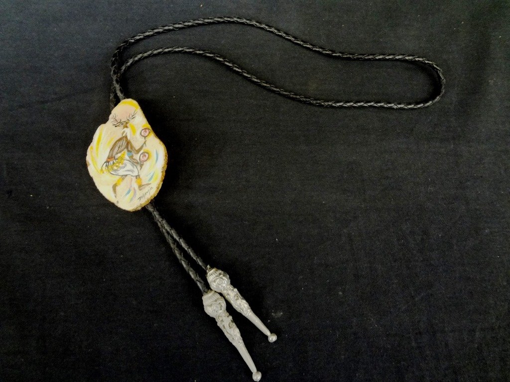 Ted DeGrazia Hand Painted Bolo Tie Dancer: Ted DeGrazia Hand Painted Bolo Tie Dancer: An extremely nice bolo tie from DeGrazia. Hand painted with DeGrazia sticker on reverse. Nice piece.