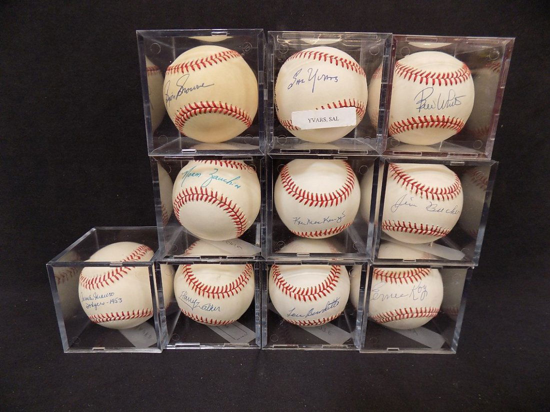 Old Timers Autographed Baseball Lot 10 Different: Bill White, Byron Browne, Carmen Mauro, Harry Walker, Sal Yvars, Ken McKenzie, Jim Bucher, Lou Burdette, Ernie Koy, Norm Zauchin. All Signatures are on Official Major League Baseballs. Lot comes with