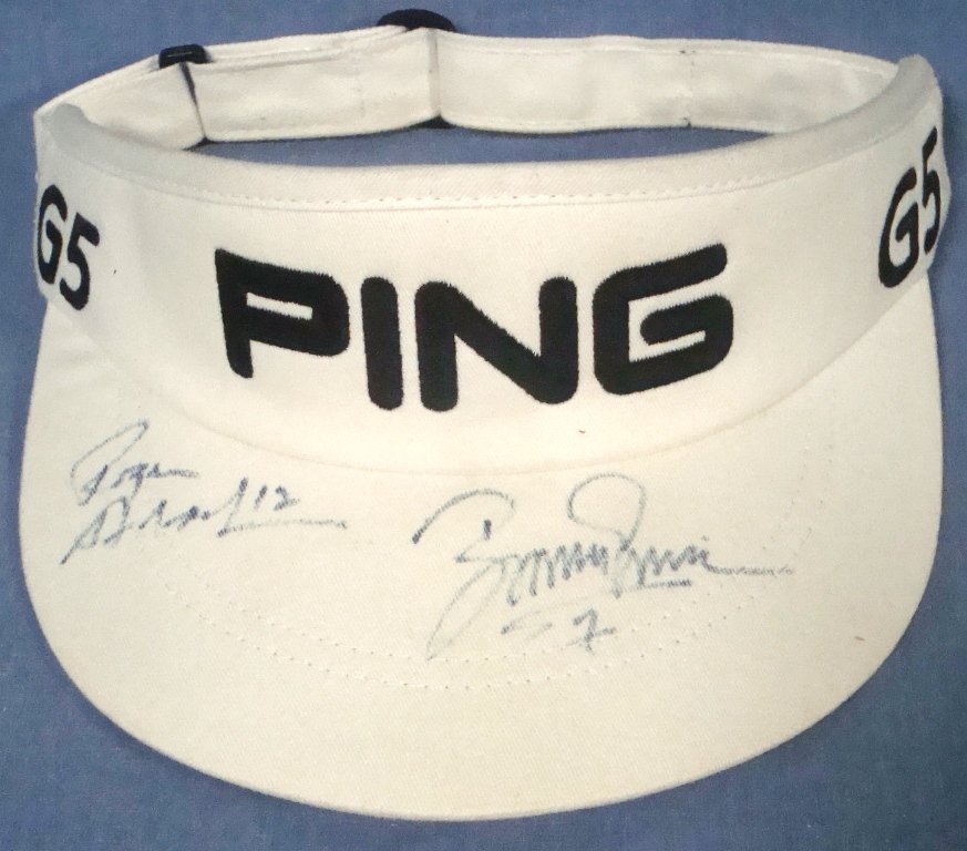 Roger Staubach Boomer Esiason Dual Signed PING Golf: Roger Staubach Boomer Esiason Dual Signed PING Golf Visor; PING G5 white golf visor dual signed on top of the bill by Football superstars, Roger Staubach and Boomer Esiason; each signed in black fiber