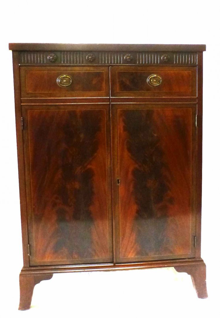 Colonial Arts 2 Door Locking Liquor Cabinet: 35" tall, x 25" x 16" deep.