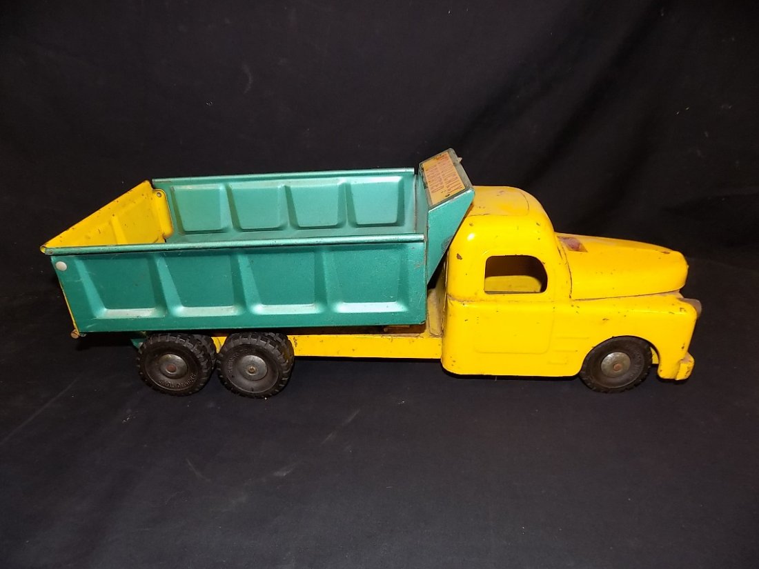 1940"s Structo Hydraulically Operated Pressed Steel: 1940"s Structo Hydraulically Operated Pressed Steel Dump Truck Decals are in place and Original, normal wear and tear play use