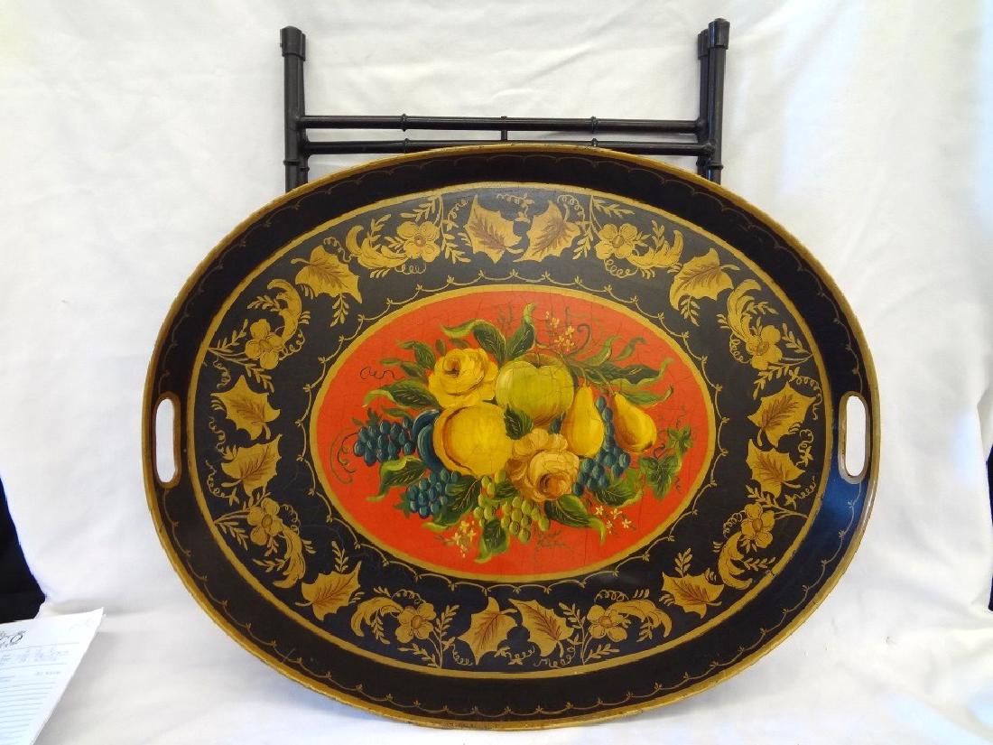 Hand Painted Tole Style Serving Tray on Stand: Hand Painted Tole Style Serving Tray on Stand: 24" high stand height, tray measures 25.25 x 20.25. Fruit decoration with leaf scroll detail. Very little paint loss.