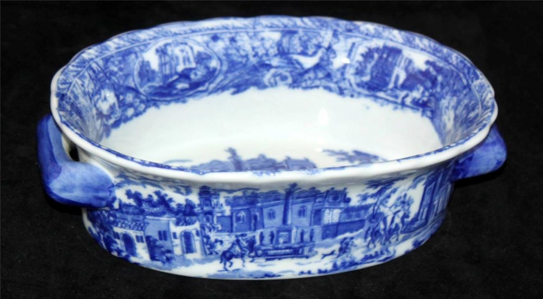 Two Handle Serving Dish Flow Blue Colonial Design: 9 x 6 x 3 Blue scene on bottom resembles colonial Boston. Theme is reproduced around top edge and along outside diameter.